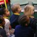 2021-05-19 school-children-being-read-to-16x9.jpg